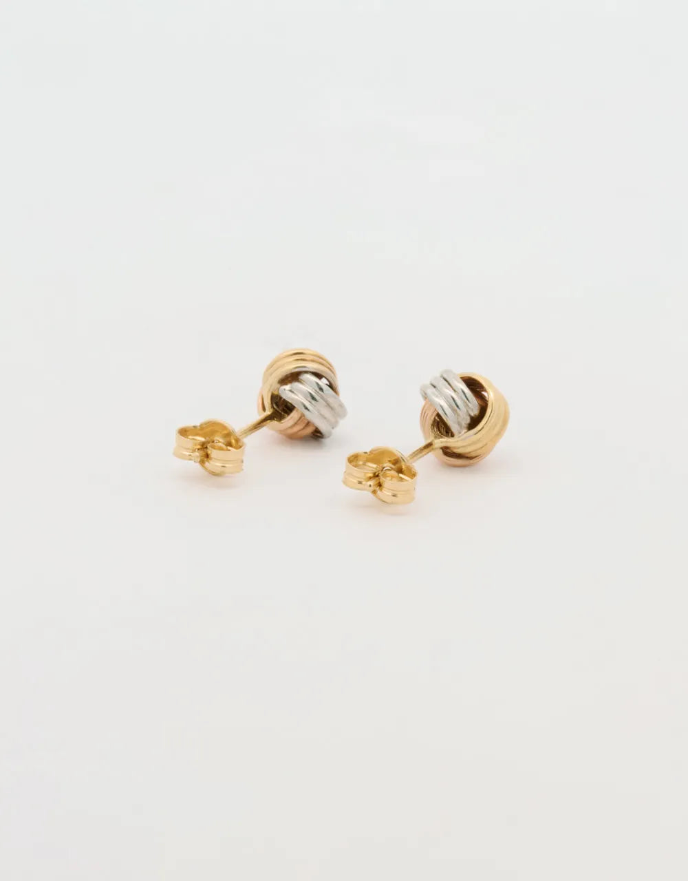 Topos mini nudo en tres oros de 18k