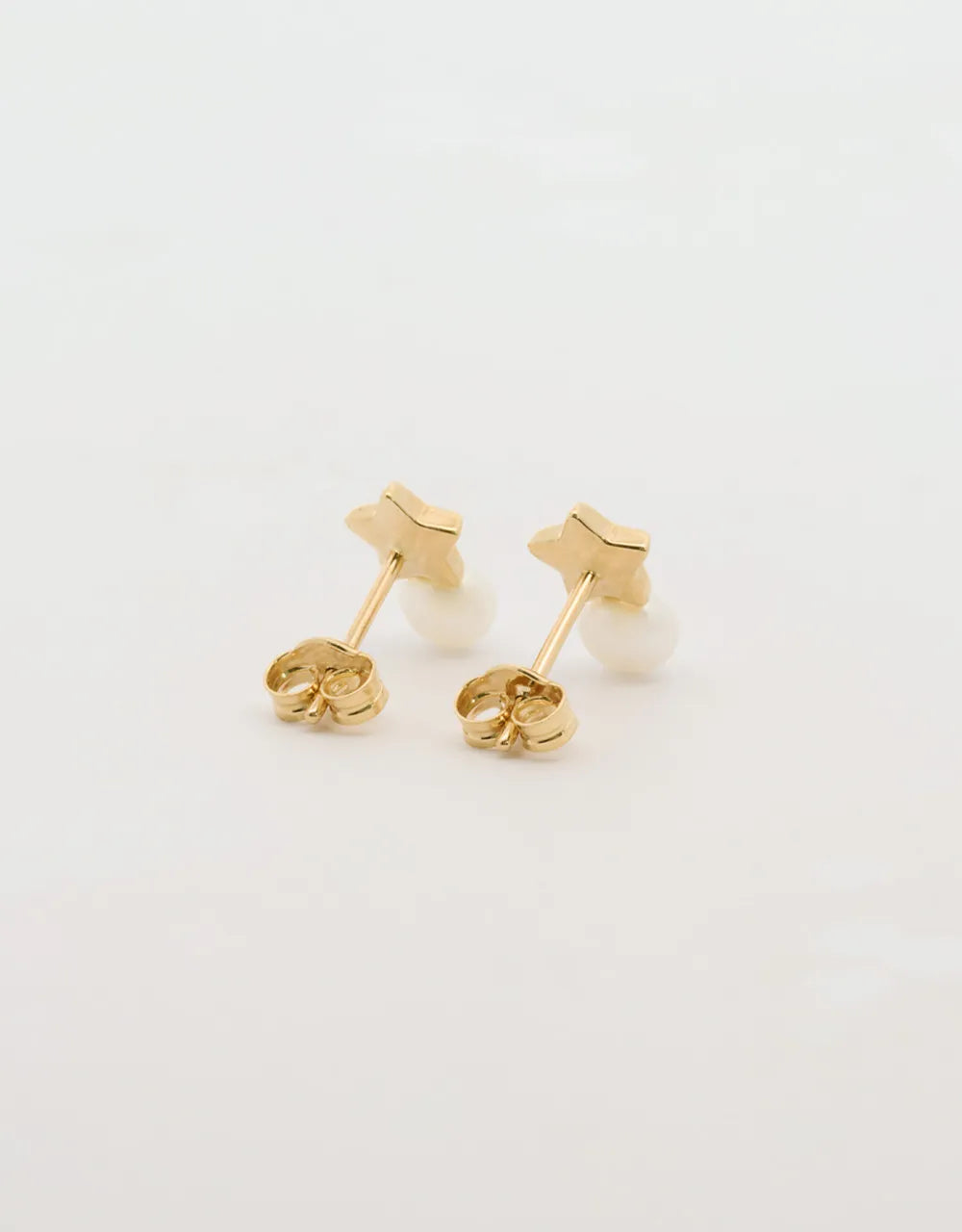 Topos de perla y estrella en oro amarillo de 18k