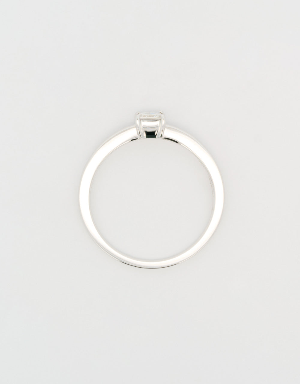 Anillo diamante central princess 0,25 quilates oro blanco 18k