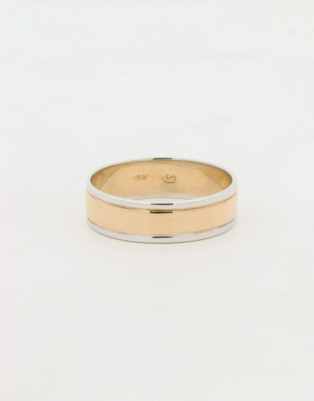Argolla en oro blanco y oro amarillo de 18k