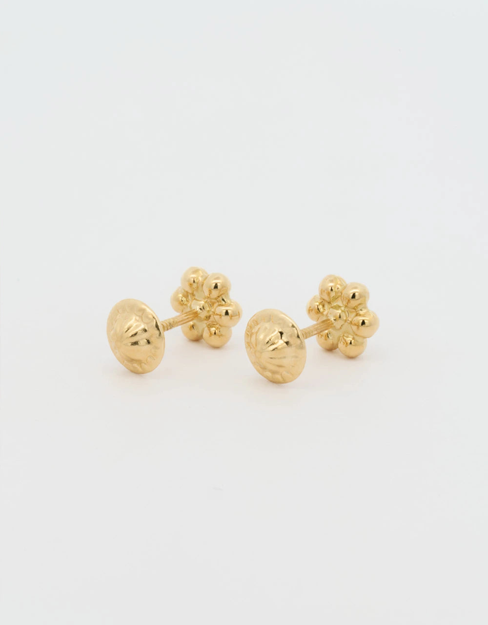 Topos de flor en oro amarillo de 18k