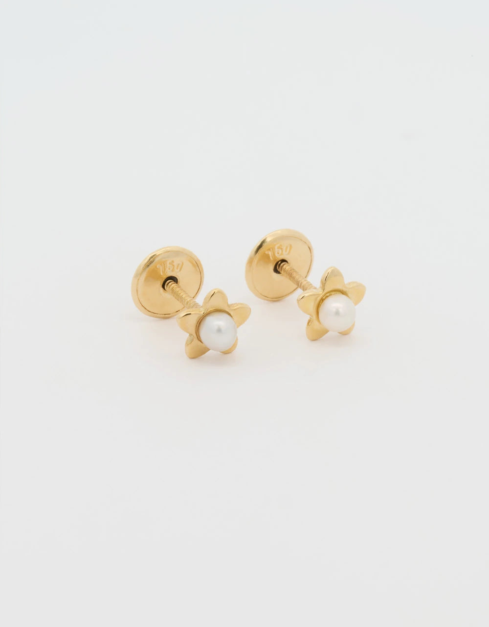 Topos mini flor perla en oro amarillo 18k
