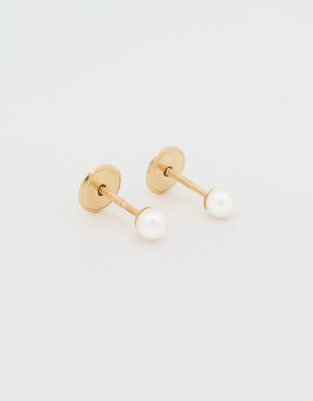 Topos de perla en oro amarillo 18k