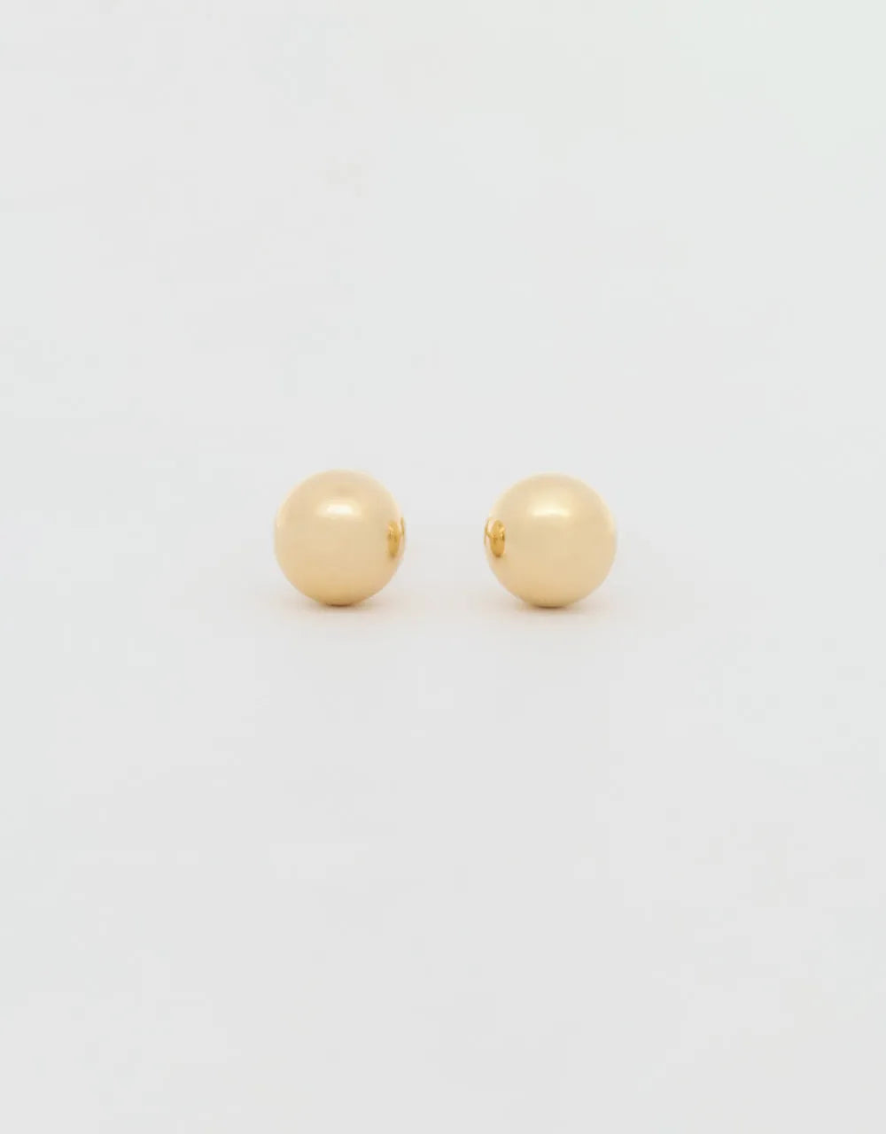 Topos esféricos en oro amarillo 18k