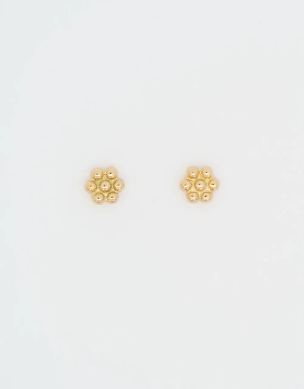 Topos de flor en oro amarillo de 18k