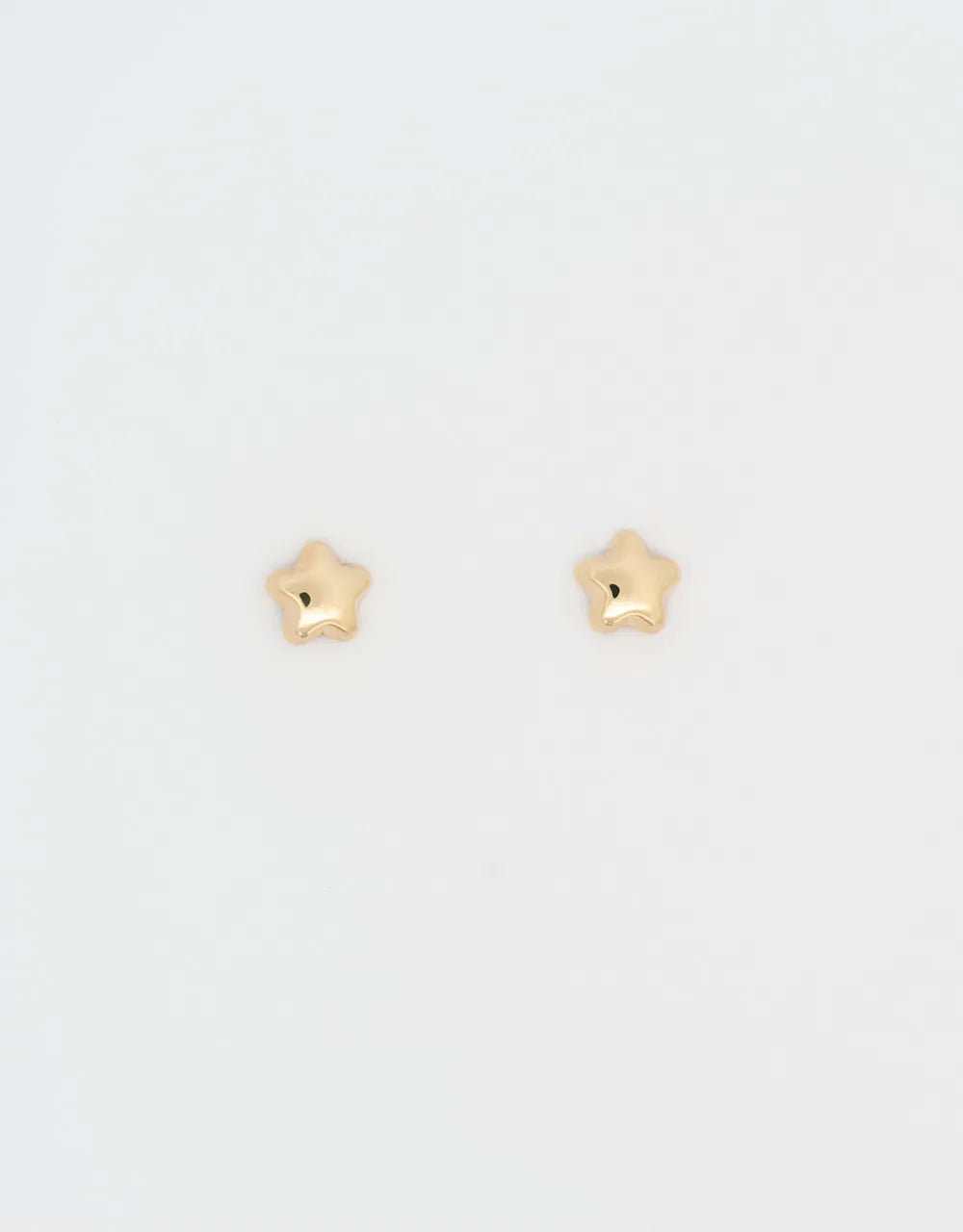 Topos mini estrellas en oro amarillo 18k