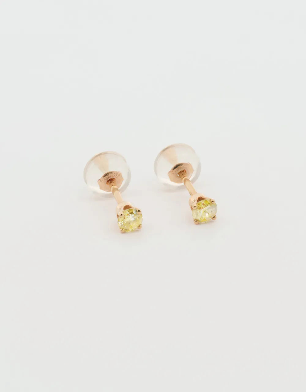 Topos de diamante amarillo 0.19 quilates en oro rojo 18k