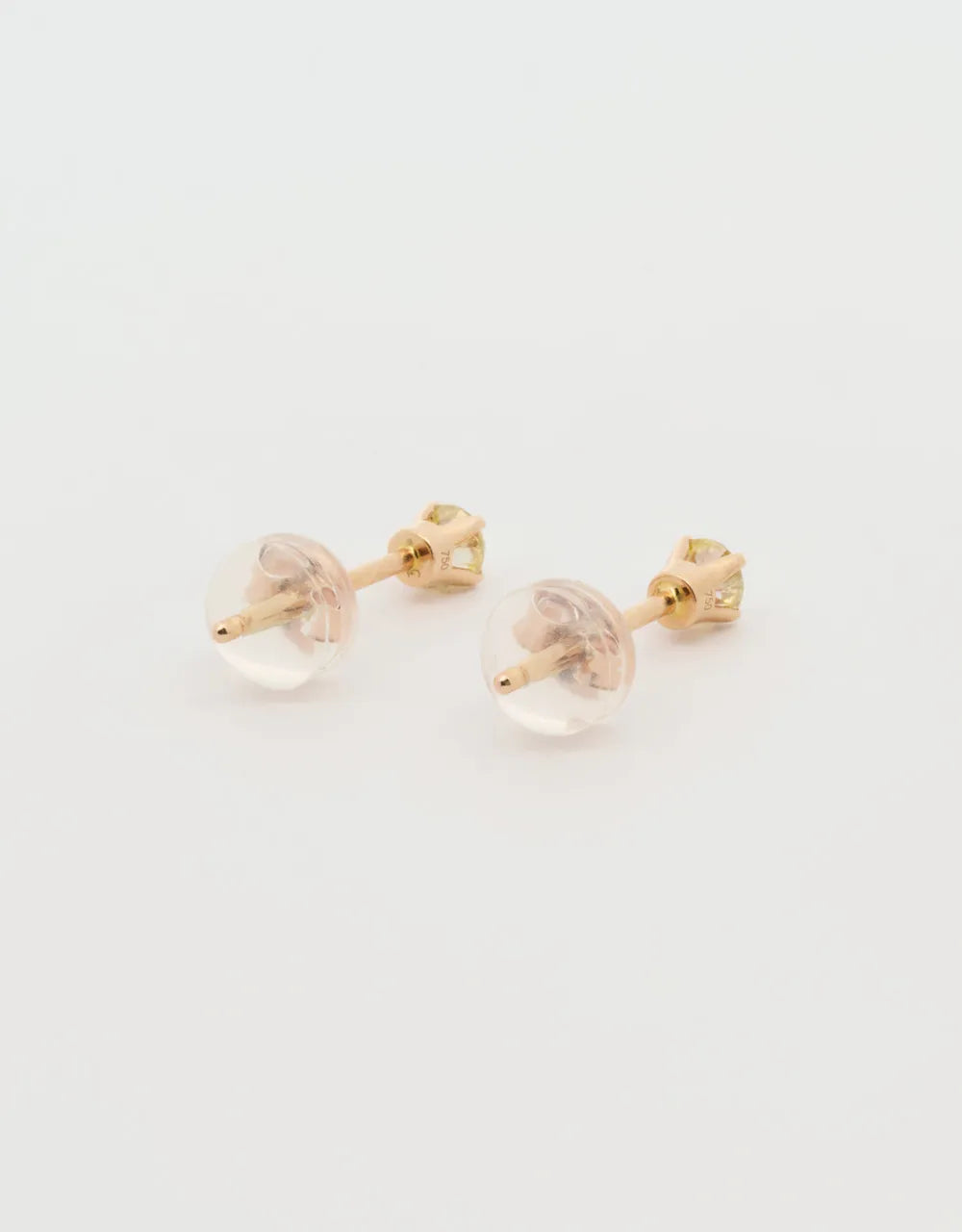 Topos de diamante amarillo 0.19 quilates en oro rojo 18k