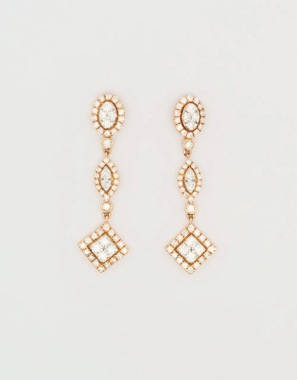 Aretes semilargos de diamantes de 1 quilate en oro rojo de 18k