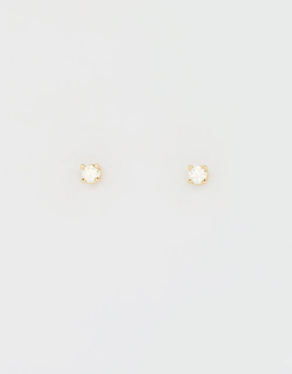 Topos de diamantes 0.10 quilates en oro amarillo 18k