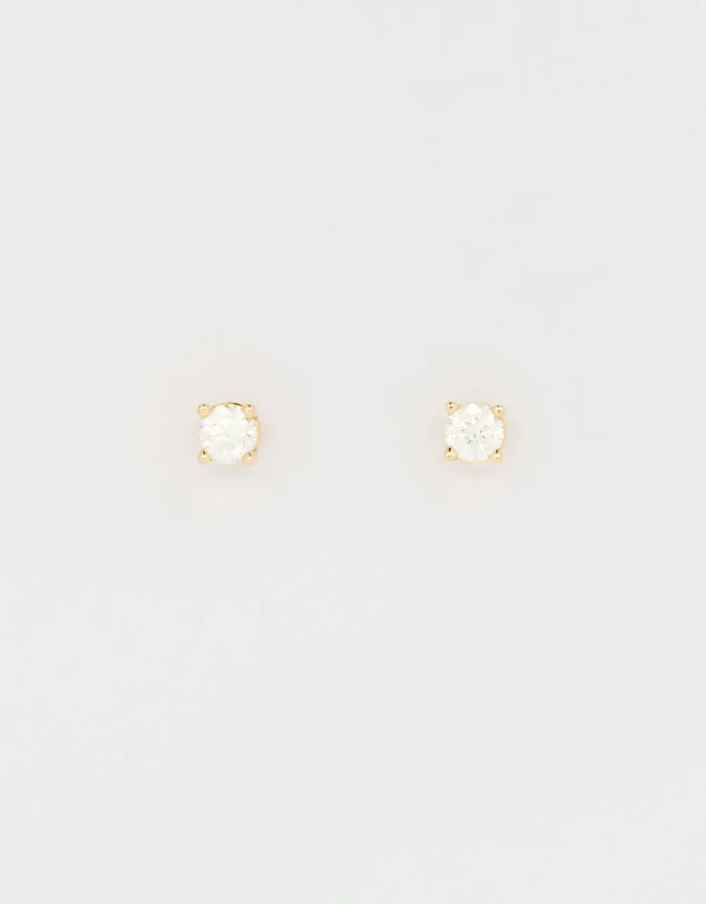 Topos de diamantes 0.30 quilates en oro amarillo 18k