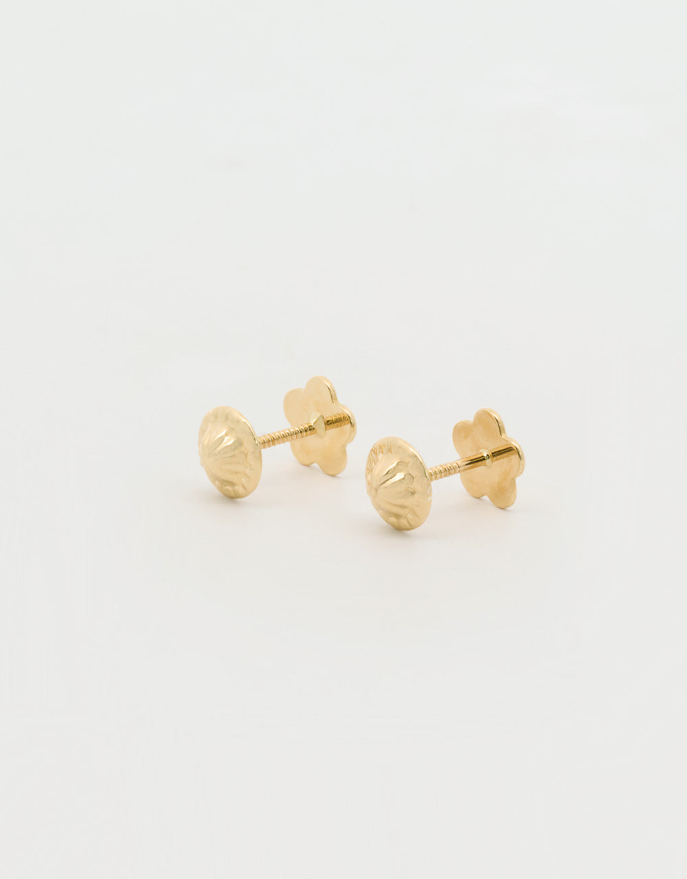 Topos mini estrella en oro amarillo de 18k
