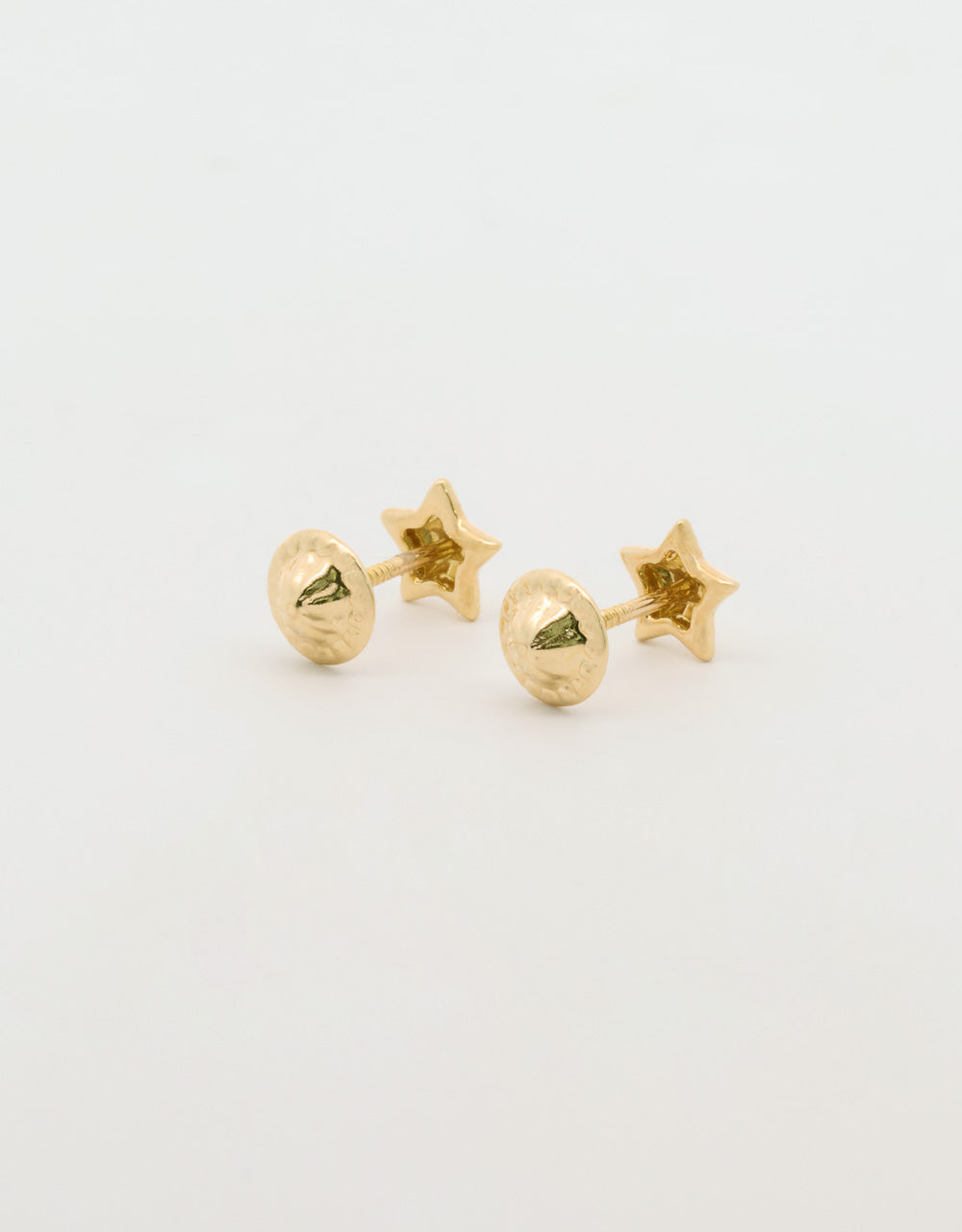 Topos estrella en oro amarillo de 18k