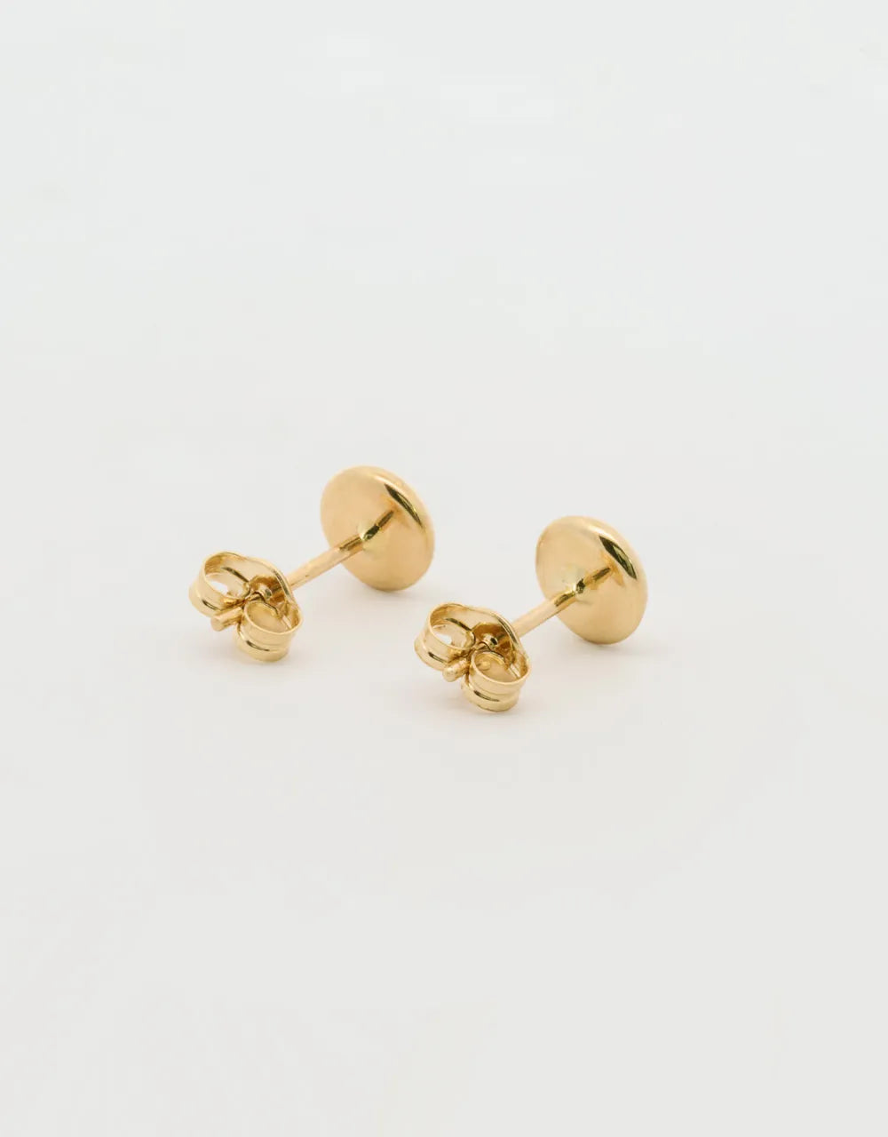 Topos redondos en oro amarillo de 18k