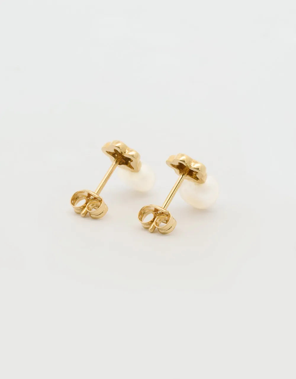 Topos de perla y estrella en oro amarillo de 18k