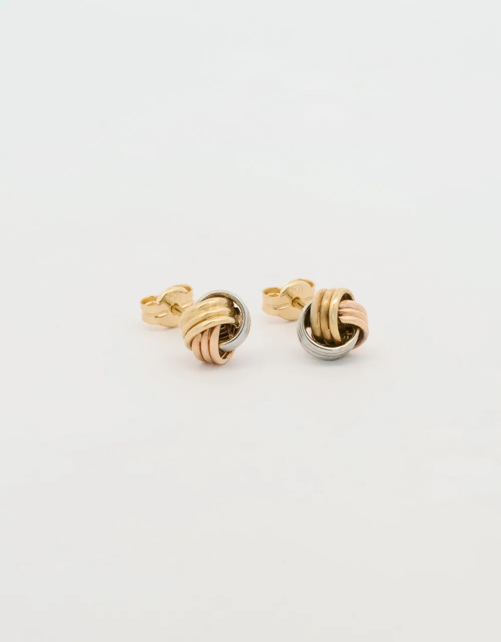 Topos mini nudo en tres oros de 18k