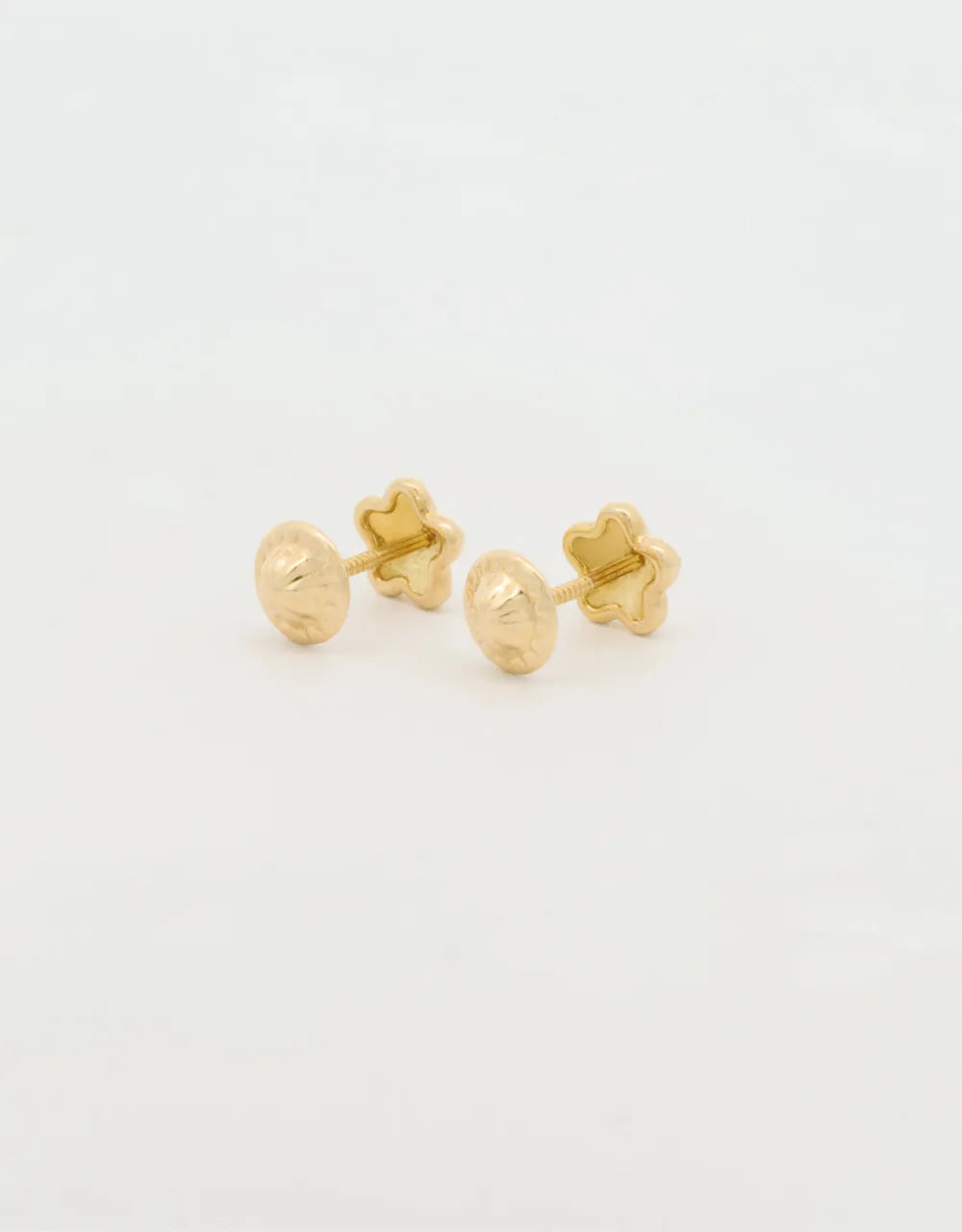 Topos mini estrella en oro amarillo de 18k