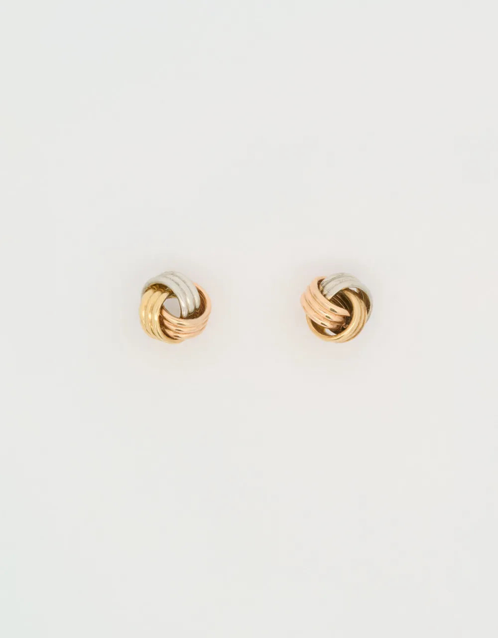 Topos mini nudo en tres oros de 18k
