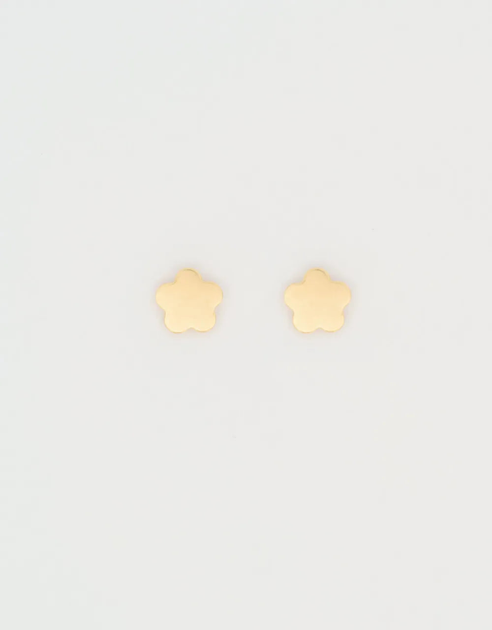 Topos mini estrella en oro amarillo de 18k