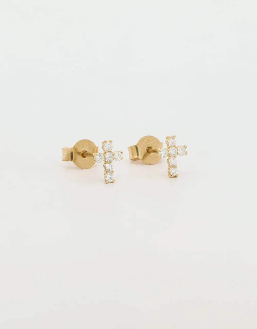 Topos cruz de diamantes de 0.22 quilates en oro amarillo 18k