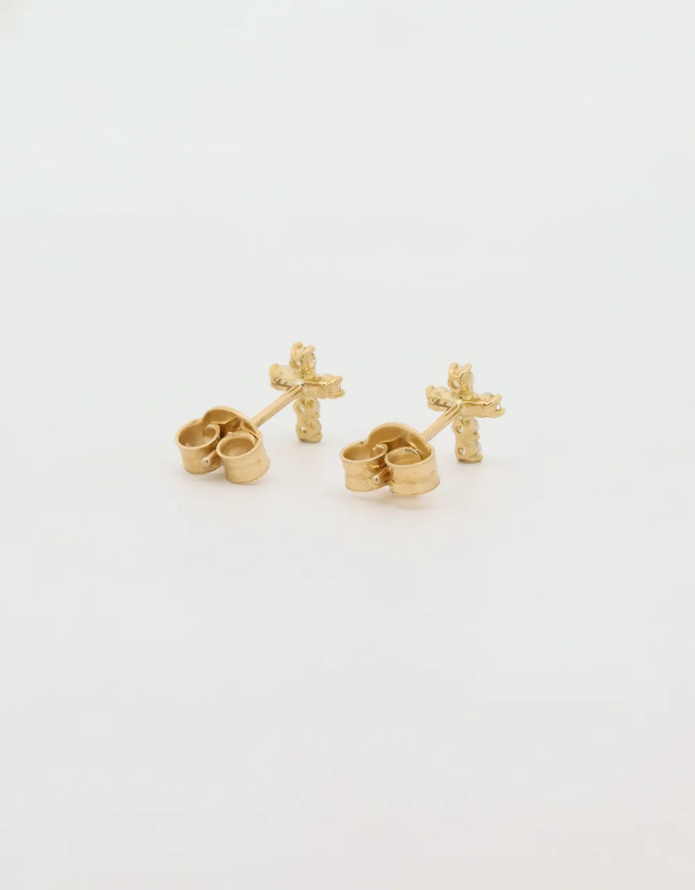 Topos cruz de diamantes de 0.22 quilates en oro amarillo 18k