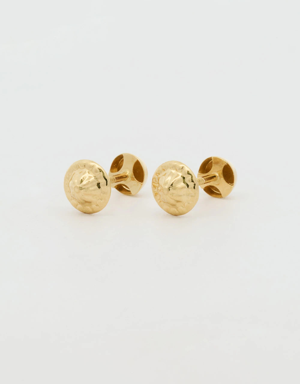 Topos redondos planos en oro amarillo 18k