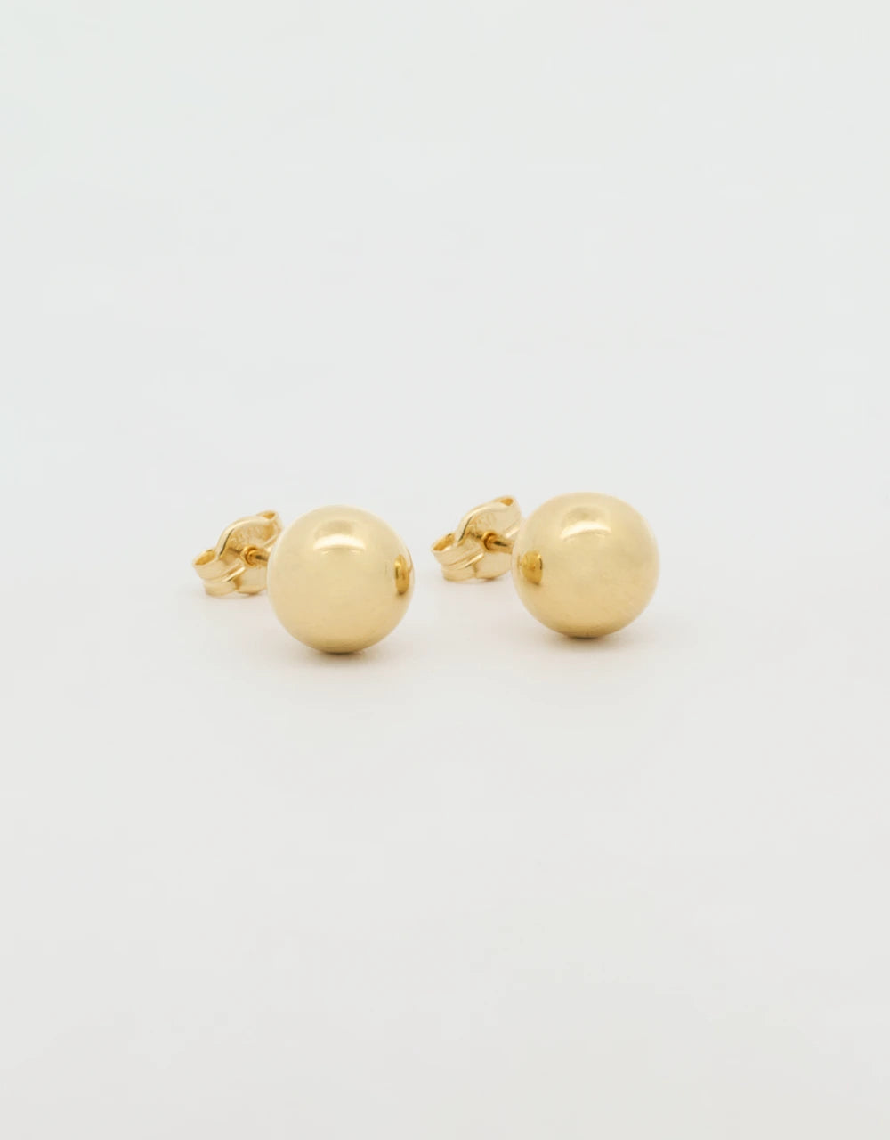 Topos de bolita de 7mm en oro amarillo 18k