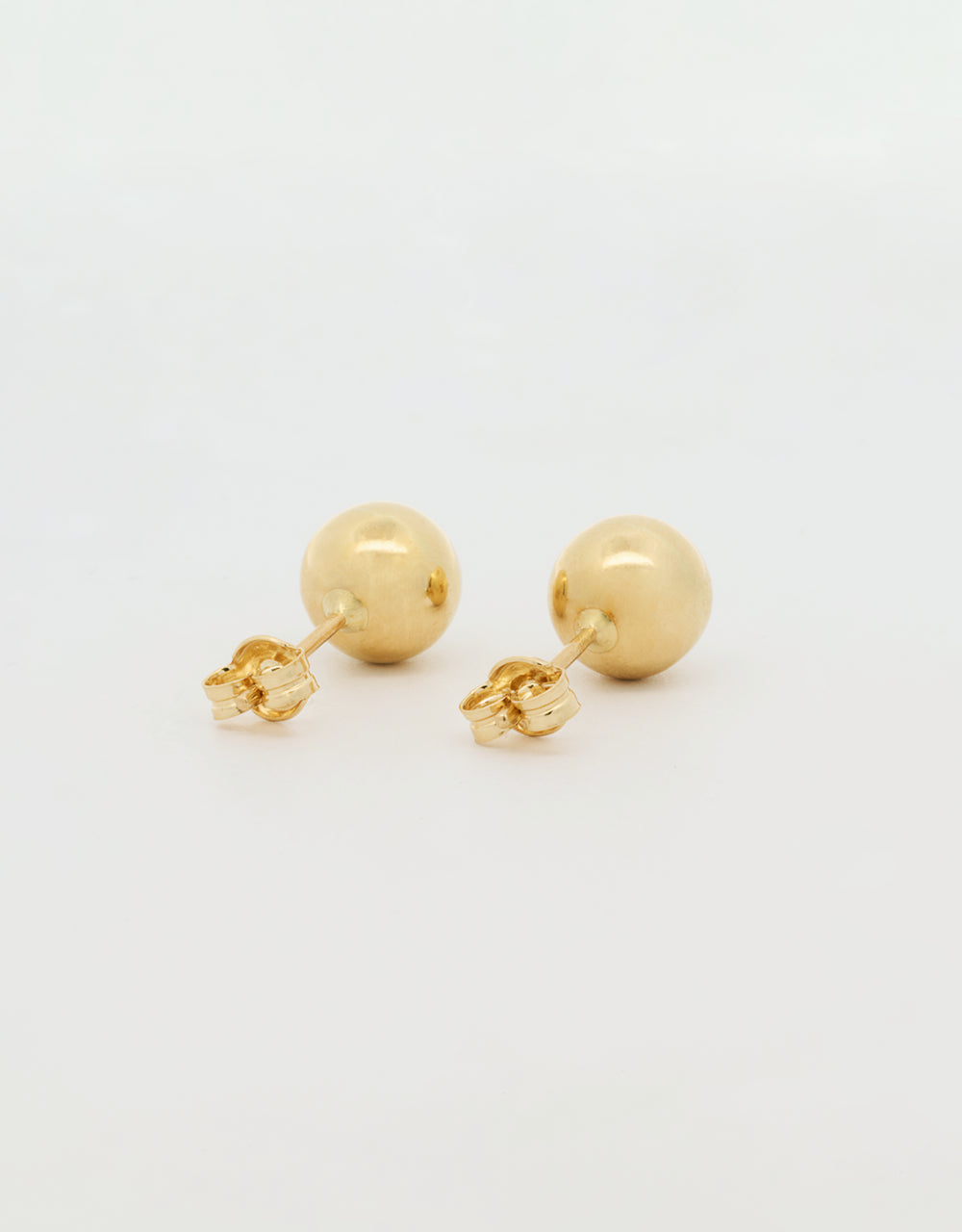 Topos de bolita de 7mm en oro amarillo 18k