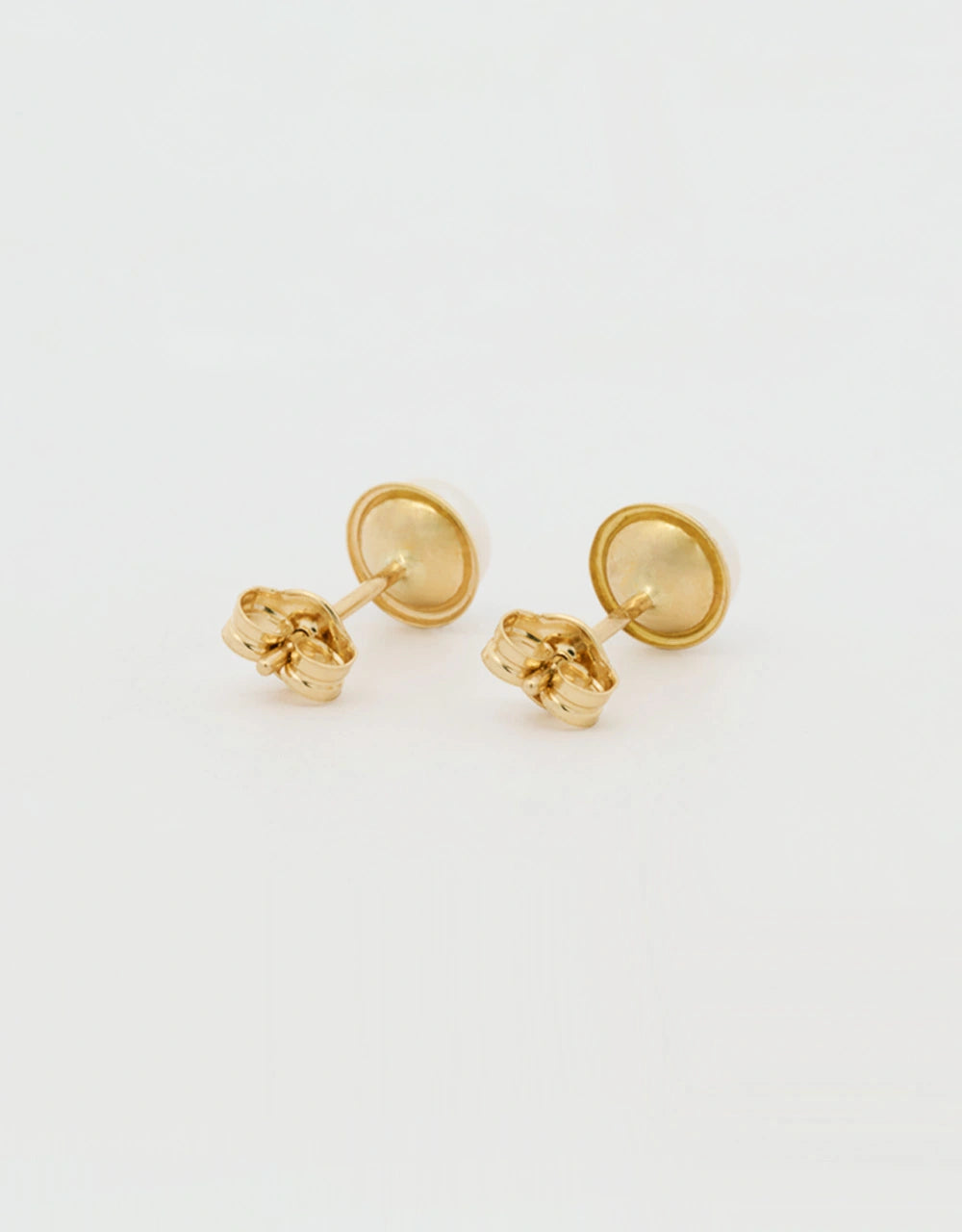Topos de perla en oro amarillo 18k
