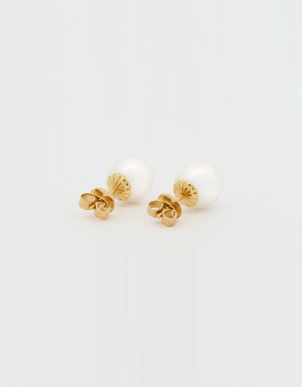Topos de perla de 10mm en oro amarillo 18k