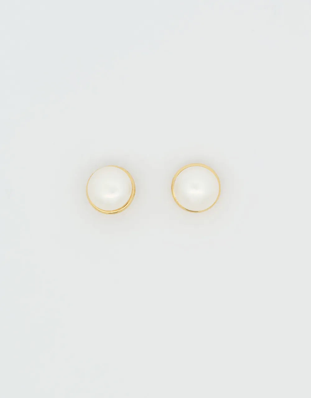 Topos de perla en oro amarillo 18k