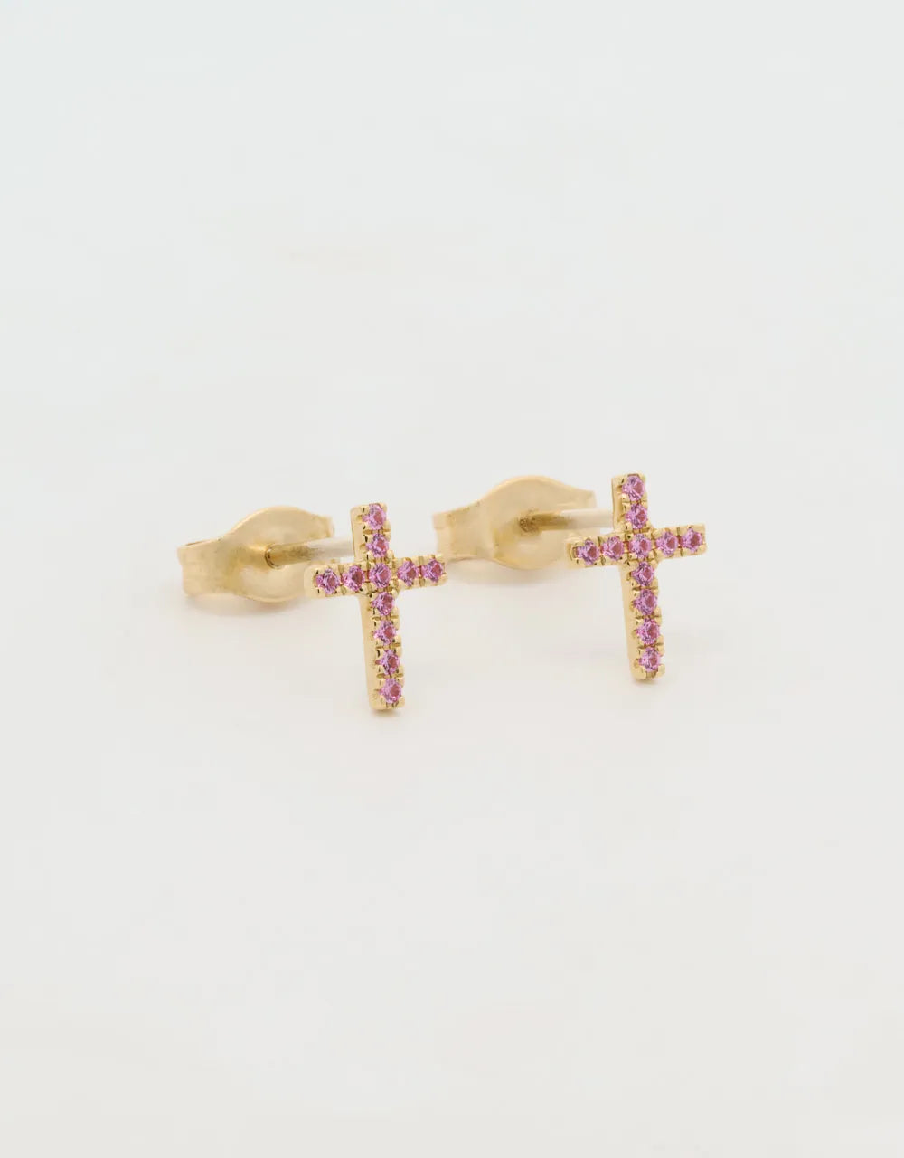 Topos mini cruz de zafiros rosados en oro amarillo de 18k