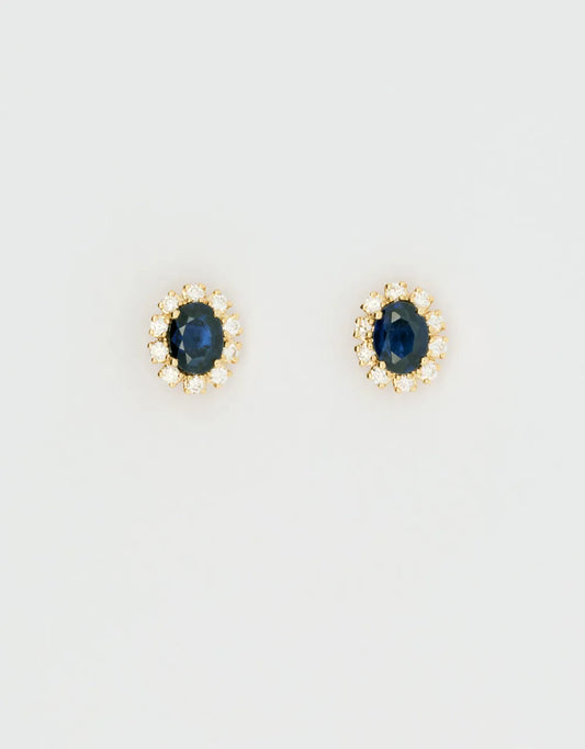 Topos de zafiro ovalado en oro amarillo de 18k