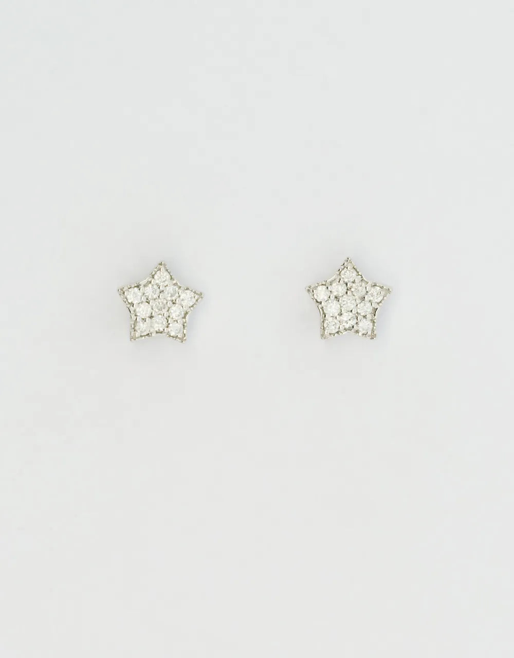 Topos de estrella de diamantes  en oro blanco de 18k