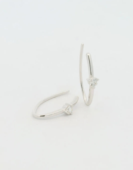 Aretes abiertos de diamante en oro blanco 18k