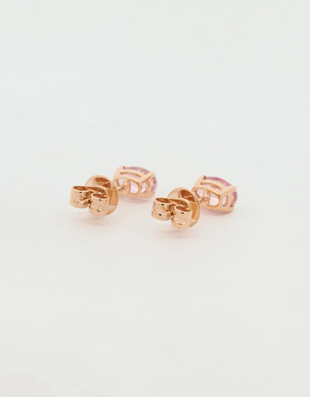 Topos de turmalina ovalados en oro rojo 18k