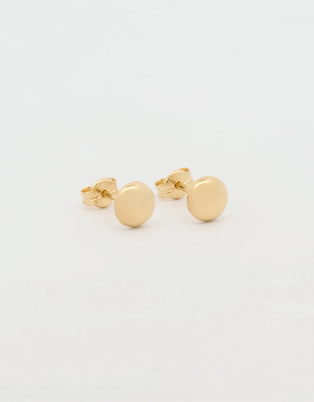 Topos redondos en oro amarillo de 18k