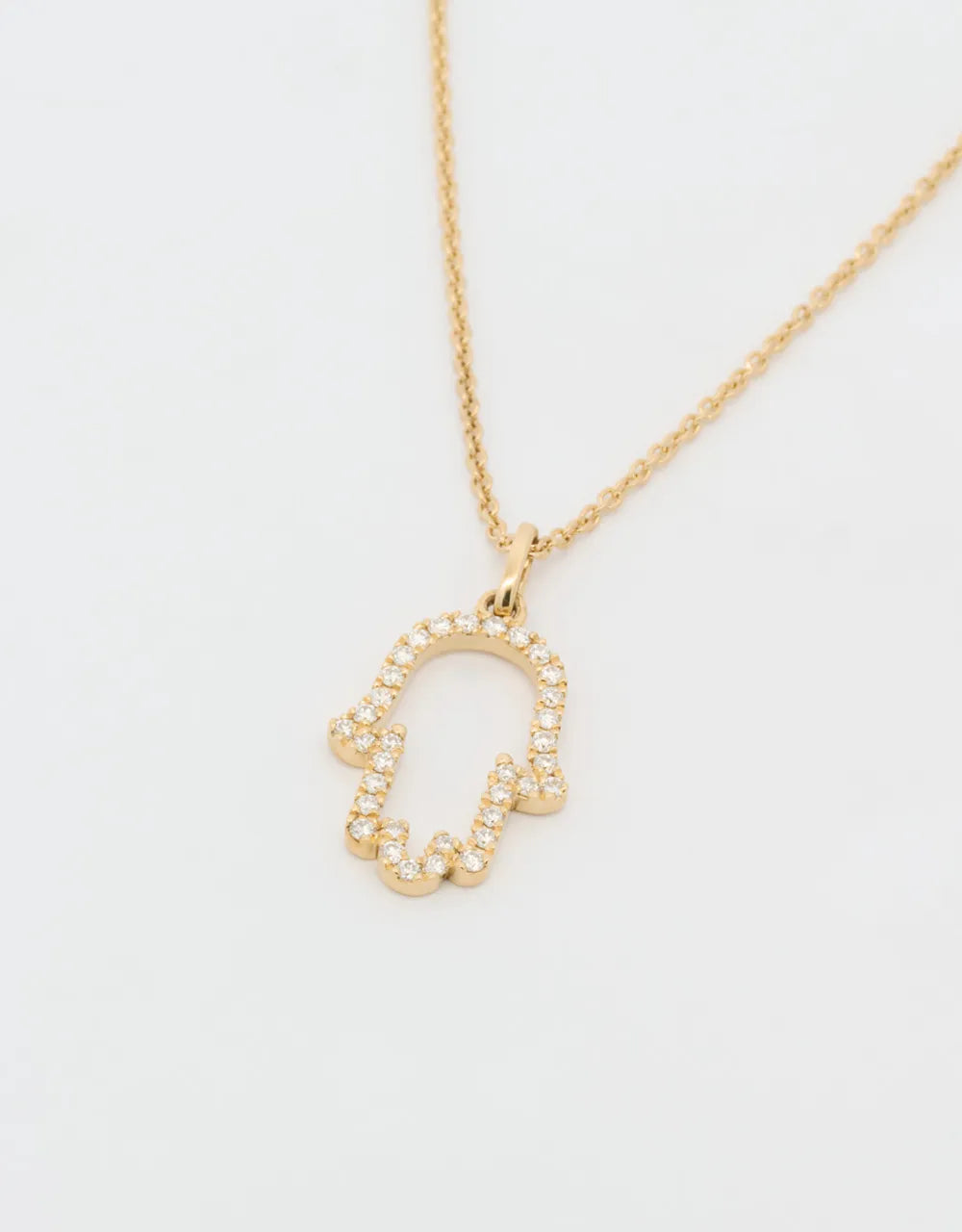 Gargantilla hamsa de diamantes en oro amarillo de 18k