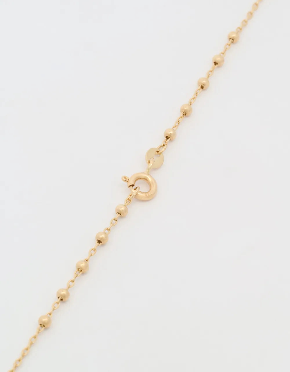 Rosario pequeño en oro amarillo de 18k