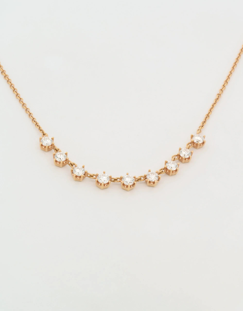 Gargantilla de diamantes en oro rojo de 18k