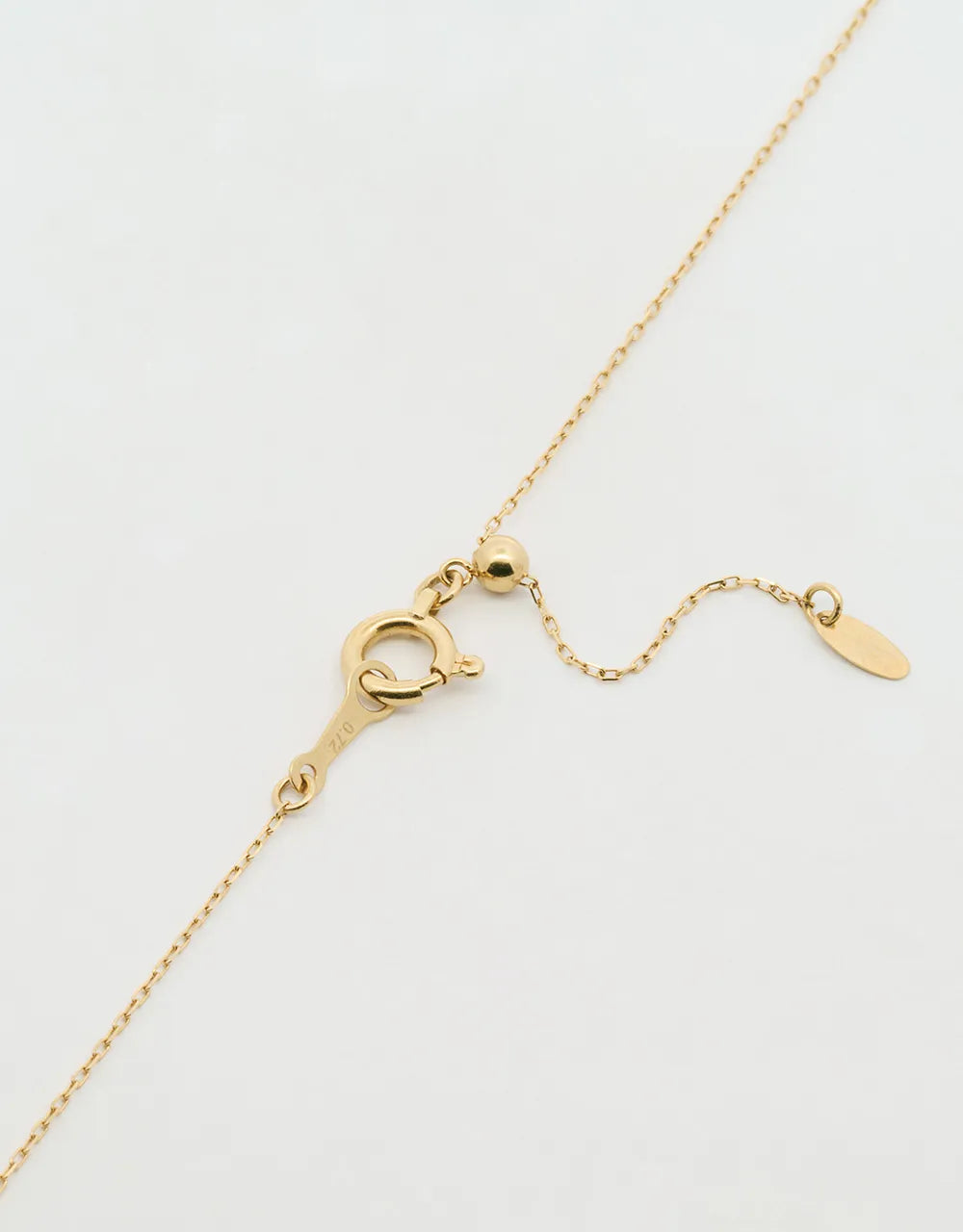 Gargantilla de 9 diamantes en oro amarillo 18k
