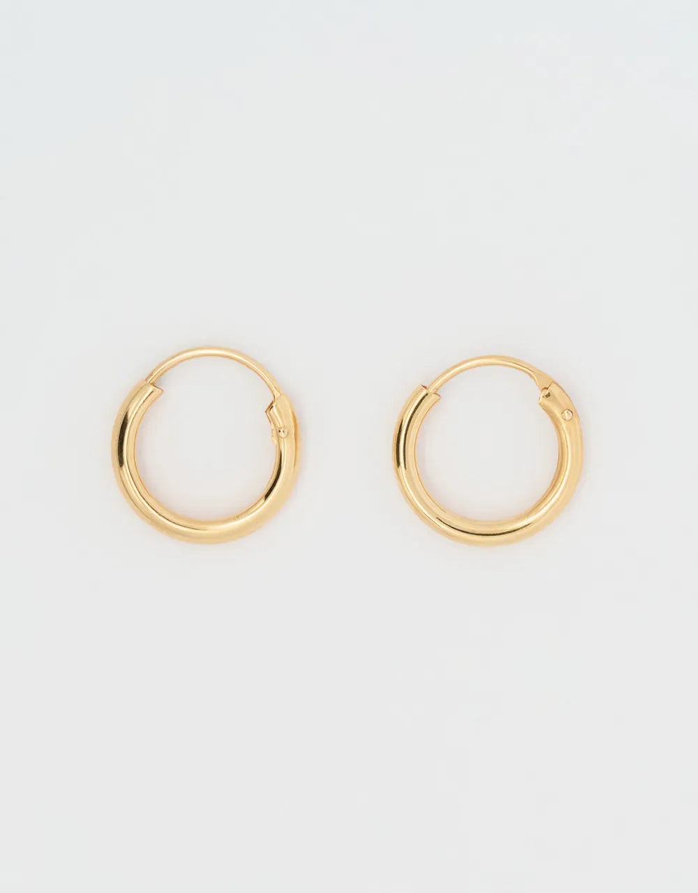 Candonga lisa en oro amarillo 18k 10mm