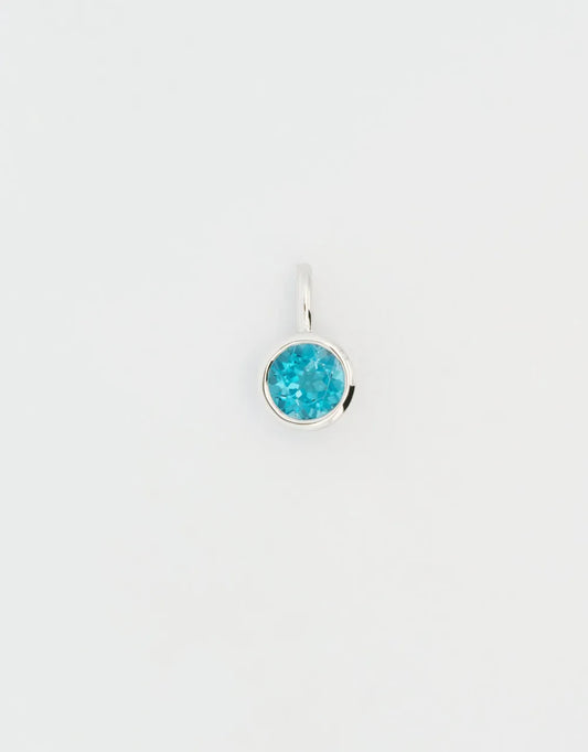 Dije de topacio en oro blanco 18k