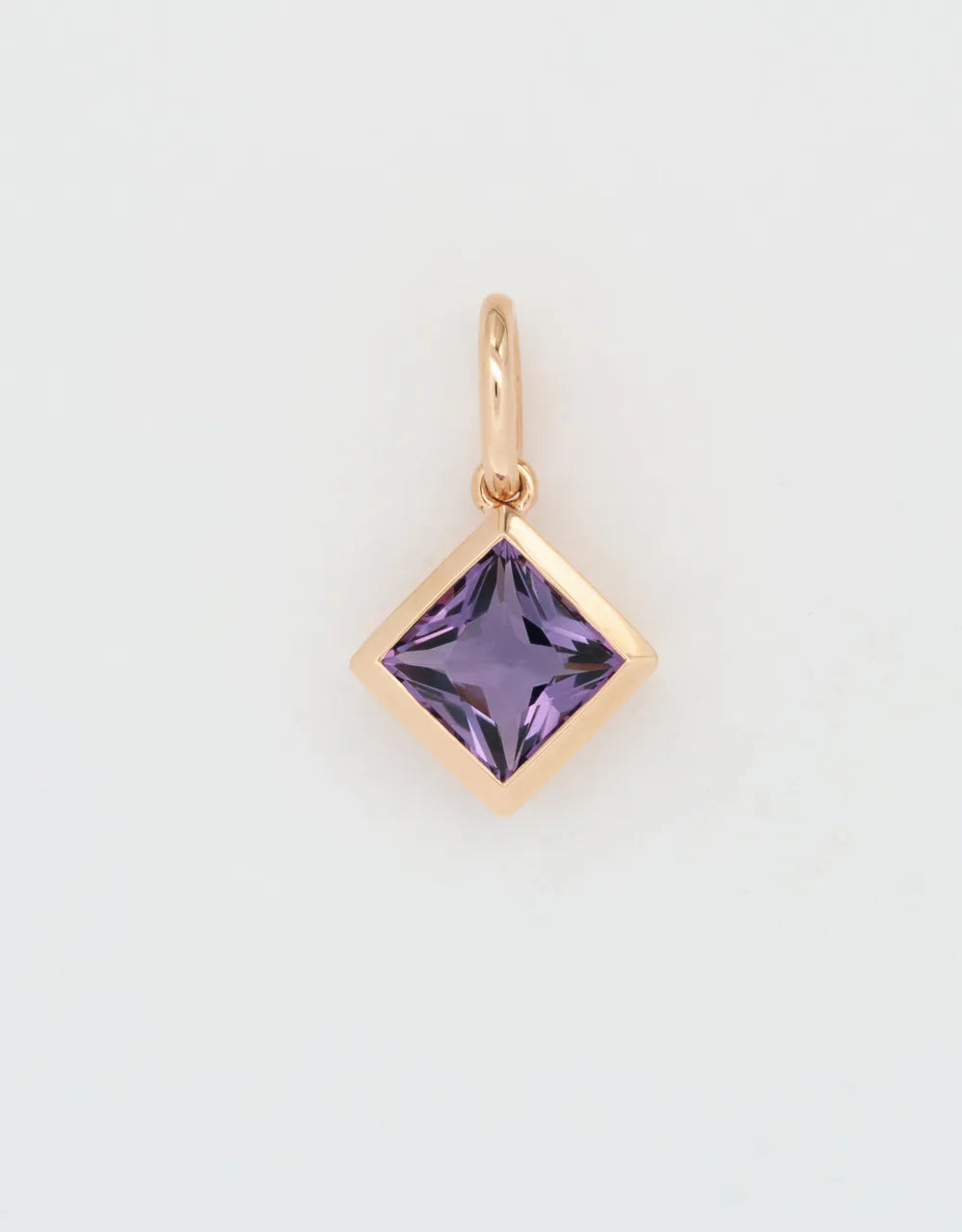 Dije de amatista en oro rojo 18k