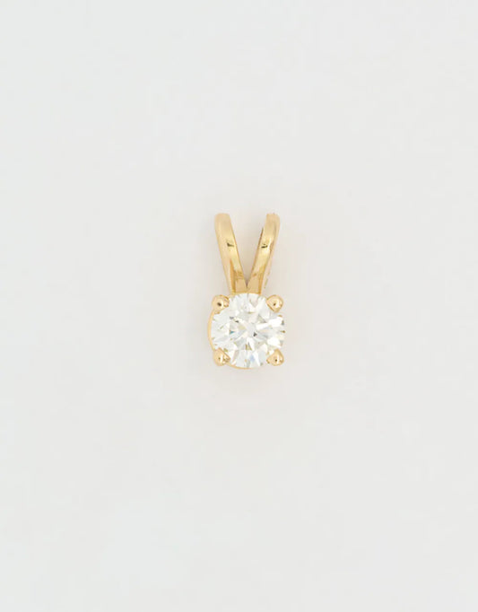 Dije diamante solitario de 0.3 quilates en oro amarillo de 18k