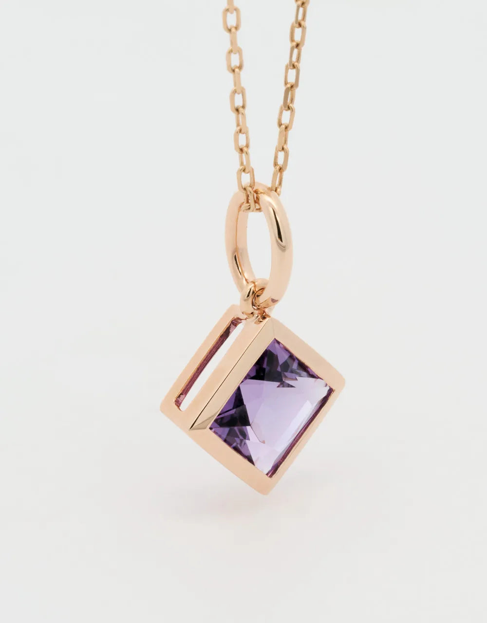 Dije de amatista en oro rojo 18k