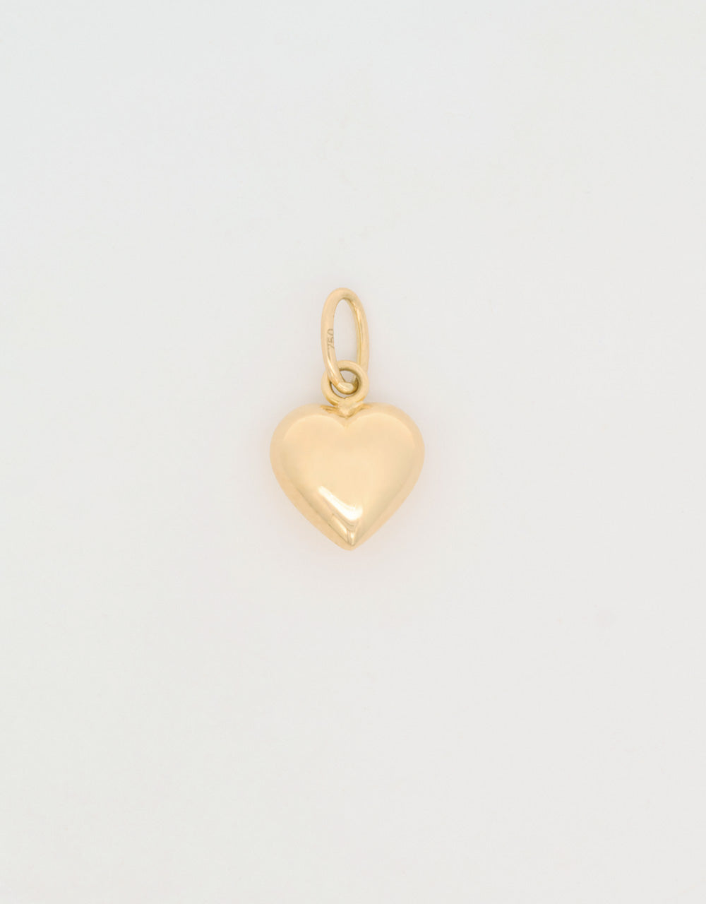 Dije mini corazón en oro amarillo 18k