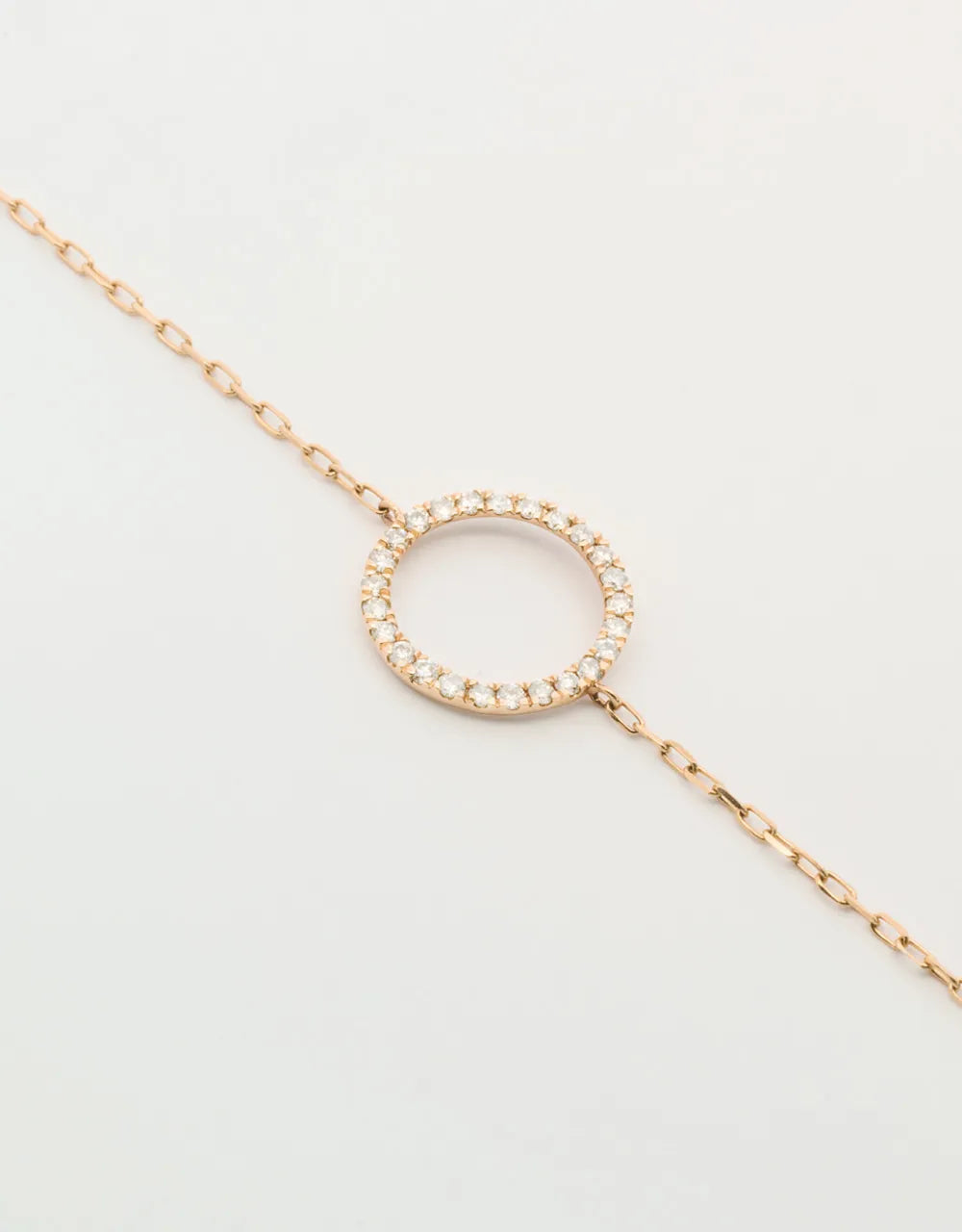 Pulsera círculo de diamantes en oro rojo de 18k