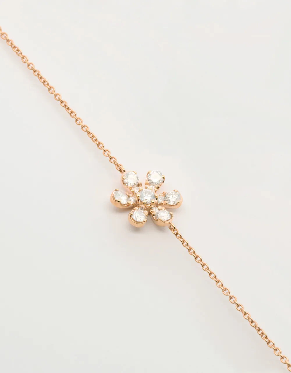 Pulsera flor de diamantes en oro rojo de 18k