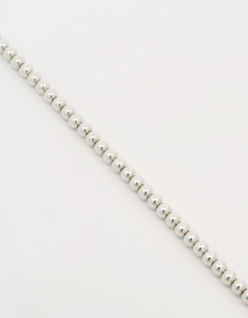 Pulsera de bolitas en oro blanco de 18k